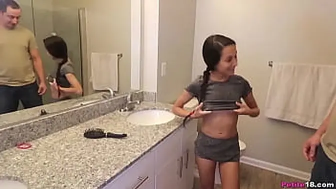 Adorable 18-year-old painter plays hard with tiny girl in bikini