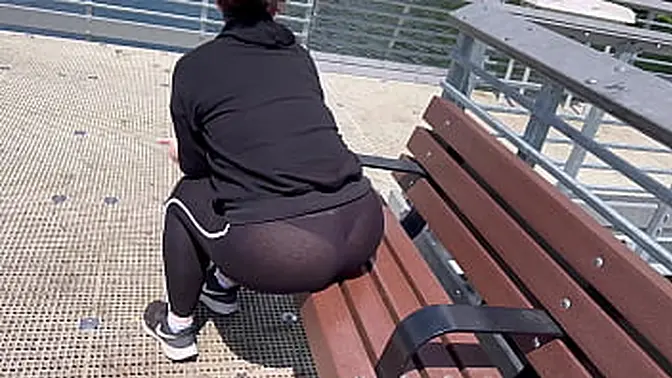 Curvy MILF shows off huge booty in public