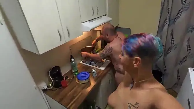 Amateur wife shows off short hair and natural tits at nudist gathering