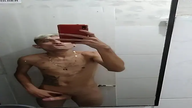 Jerking off in the bathroom after the football game