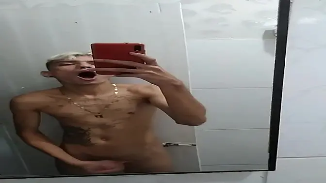 Jerking off in the bathroom after the football game