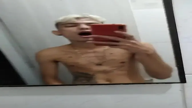 Jerking off in the bathroom after the football game