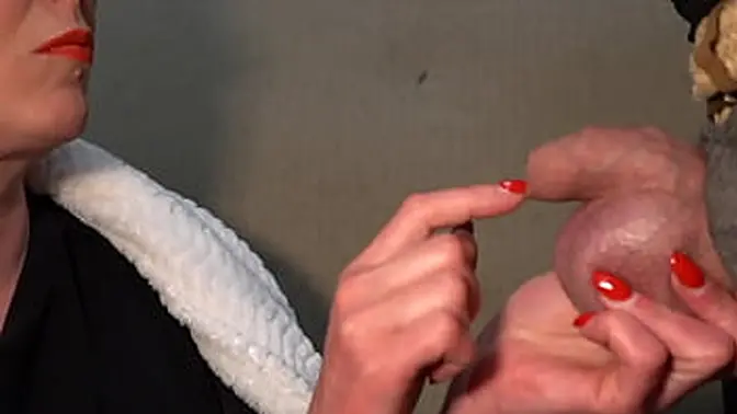 Smokin' MILF gives sloppy handjob with cum in mouth