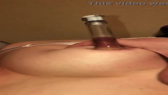 Japanese MILF wife pumps big tit and nipple