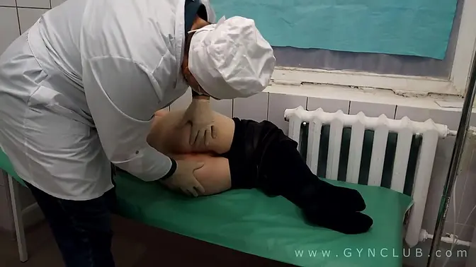 Doctor examines and probes busty patient