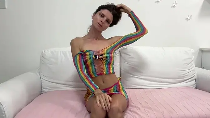 Sultry webcam girl wields sex toy and gives a handjob