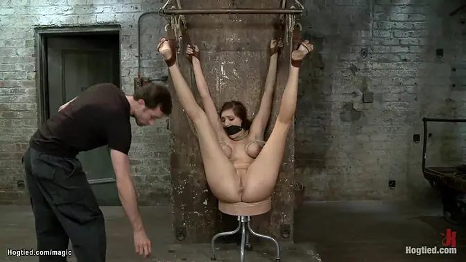 Hot little brunette slave Holly Michaels first time gets hogtie bondage and suspension from master James Deen then endures bondage predicaments