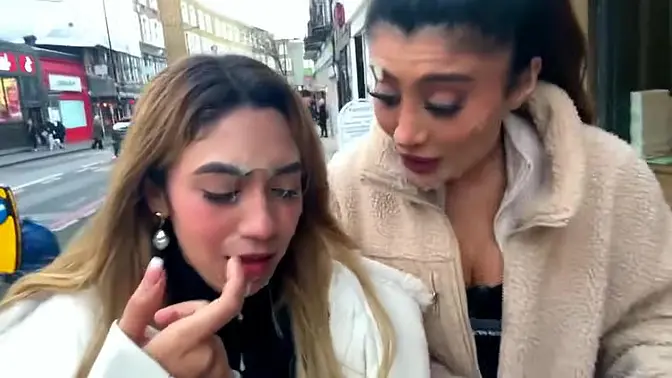 Two hot babes strut their stuff in London Cumwalk