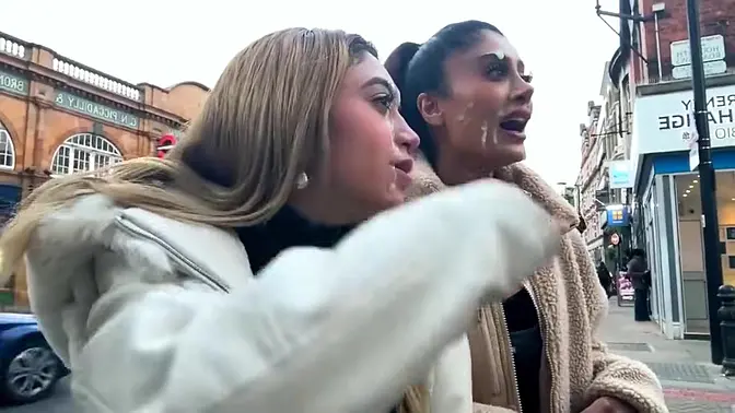 Two sexy babes strut their stuff in London Cumwalk