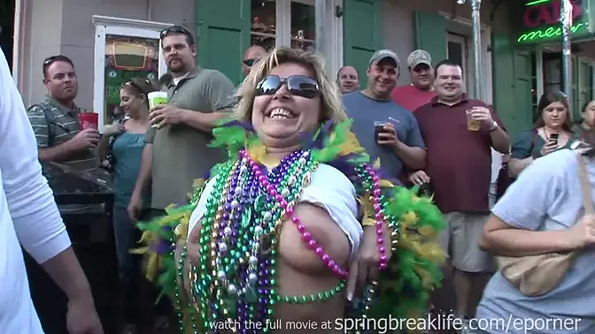 Mardi Gras babes strip and show off big boobs