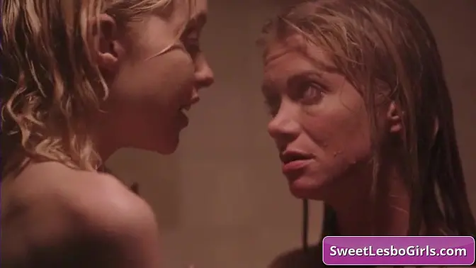 Watch these horny lesbo teenagers kissing tender and finger fucking deep while showering