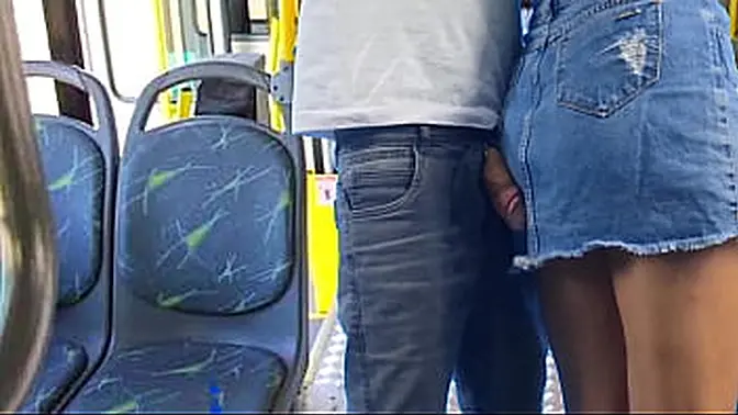 Young student's skirt lifted on the bus