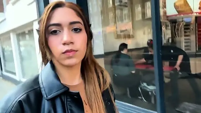 Busty Artemis Carmona struts and shows off her big boobs