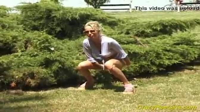 Beach babe pees in public, showing off her wild side