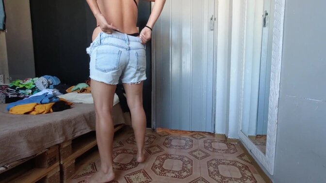 Latina wife tries on clothes and shows off her big butt