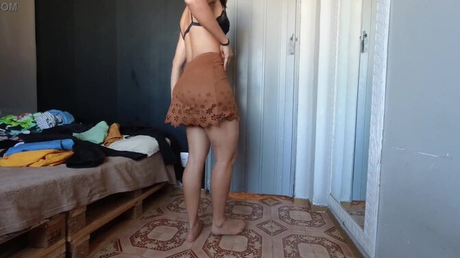 Latina wife tries on clothes and shows off her big butt
