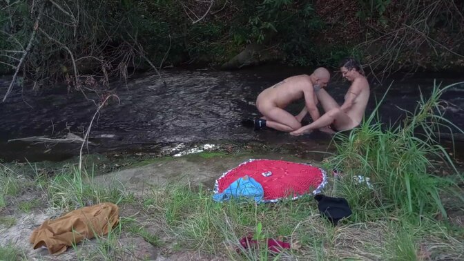 Unexpectedly, two strangers meet at the creek for a steamy encounter 