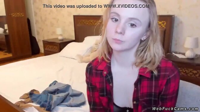 Blonde amateur teen strips off her stockings and flashes boobs in black