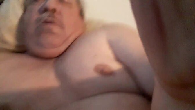 Men massage their aching cocks and balls while relaxing at home 