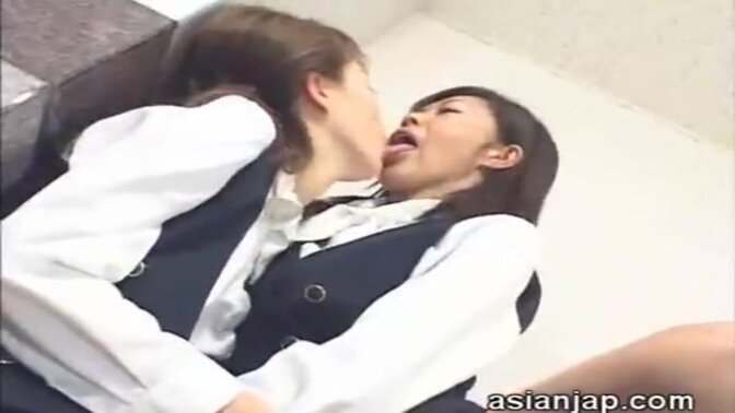 Japanese lesbians give horny tongue kisses and licks in their steamy