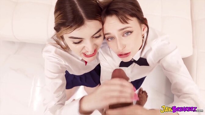 Two girls share a jawbreaker