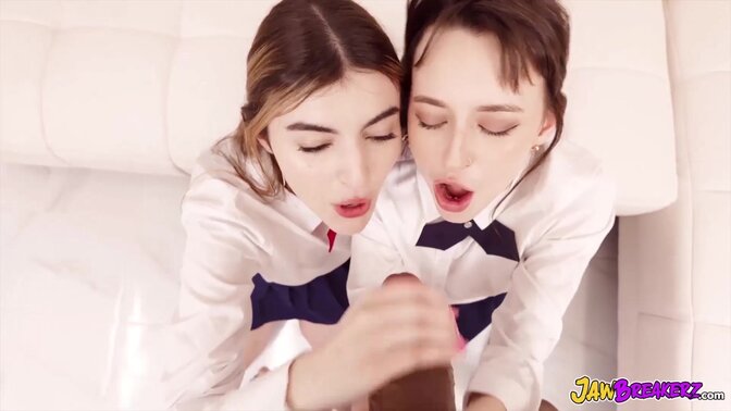 Two girls share a jawbreaker