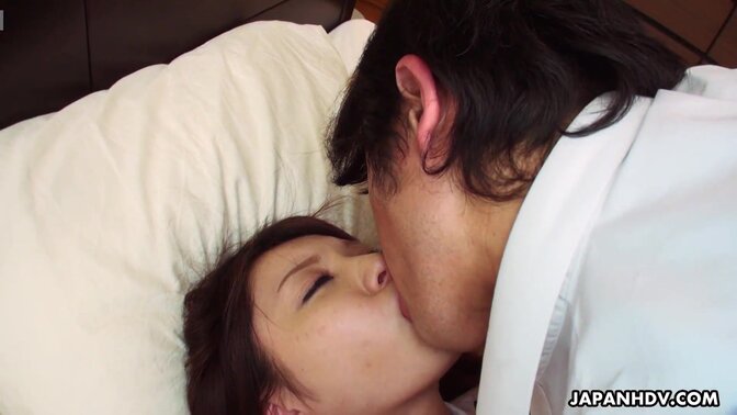 Shaved Asian babe gives a sloppy blowjob in uniform