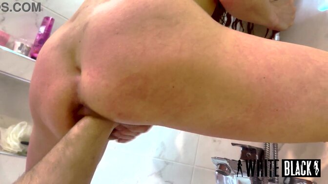 Amateur couple engages in extreme fully fisting in the bathroom