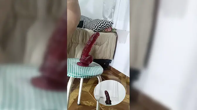 Curvy woman enjoys anal sex with red dildo at home