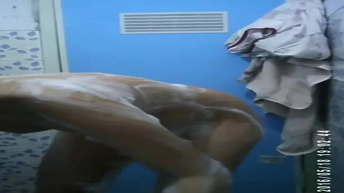 Spying on a gorgeous babe at the girl's dorm