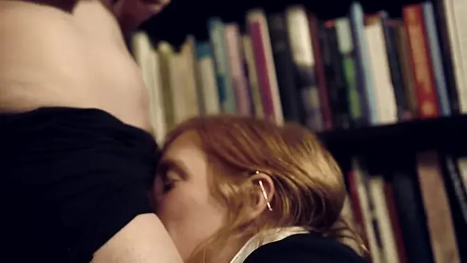 Two sexy librarians make love in the library