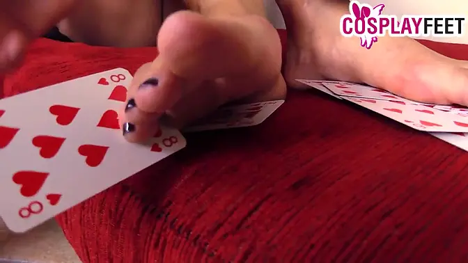 Brunette Minnie Mouse and Queen of Hearts in high heels and stockings