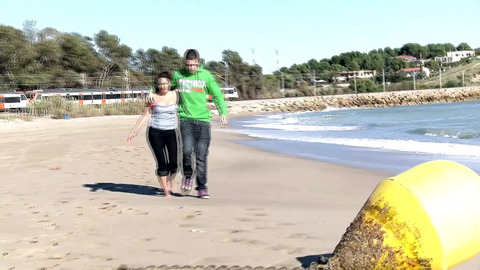 Steamy duo sneaks away from crowds at the beach, ready for an intimate and lustful escapade