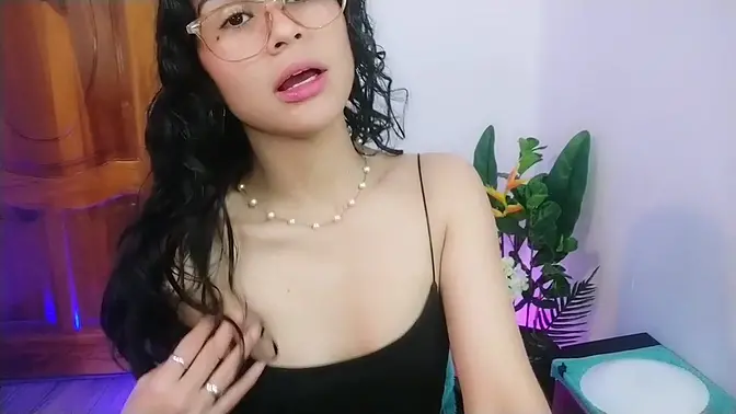 Brunette beauty twerks and plays with wet fingers