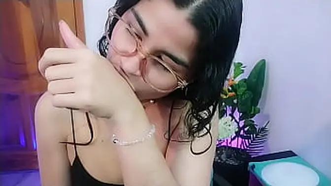 Brunette beauty twerks and plays with wet fingers