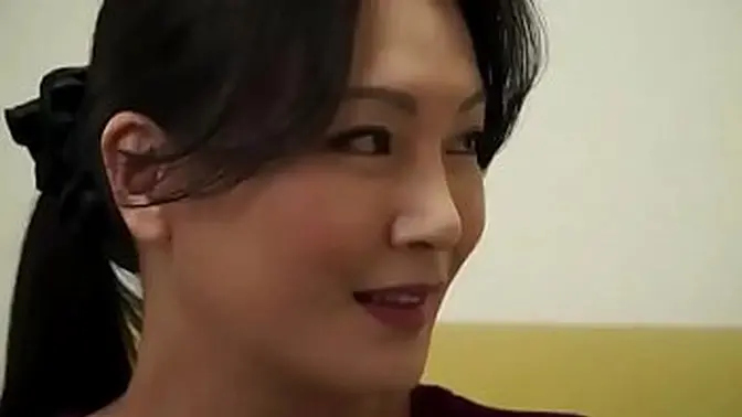 Asian MILF rides young cock and shows off big tits