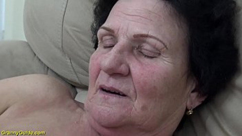 Senior milf eagerly enjoys intense sex with her youthful partner