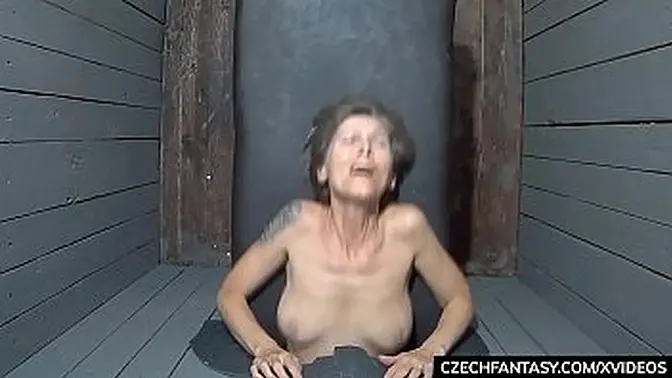 Slutty cougars squeeze in the glory hole for filthy cock🍆 sucking escapades