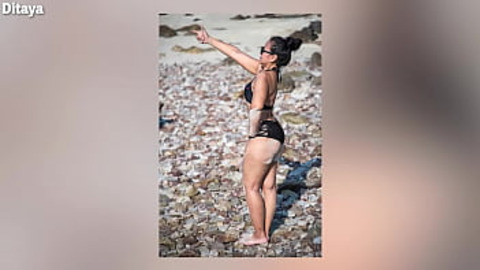 Sexy Japanese cougar gets naked on the beach, ready to screw the day away