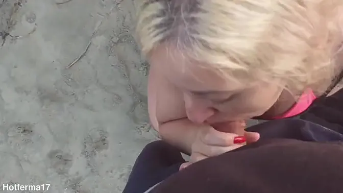 Hot blonde rides cock on public beach