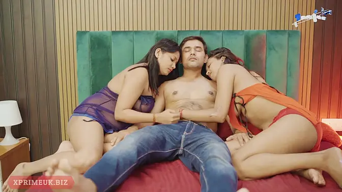 Two hot girls share a lucky guy in a steamy threesome