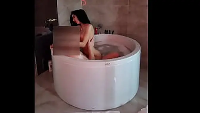 Sexy babe gives a wet blowjob in the jacuzzi bathtub
