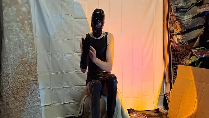 Latex Goddess squirts while dancing in rubber outfit