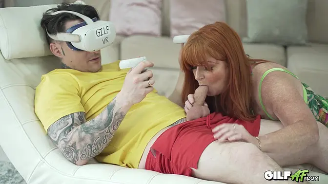 Redheaded MILF's pussy enjoys pounded by young cock