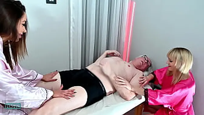 Two big-titted sluts give a massage with a double blowjob and happy ending