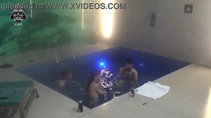 Friends and hotwife enjoy a public pool threesome