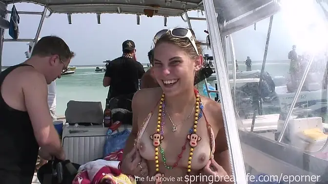 Twin sisters strip and show off their boobs in the pool