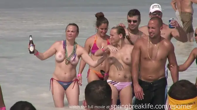 Twin sisters strip and show off their boobs in the pool