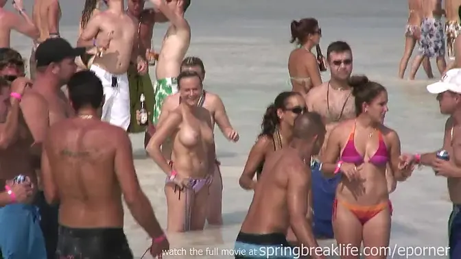 Twin sisters strip and show off their boobs in the pool