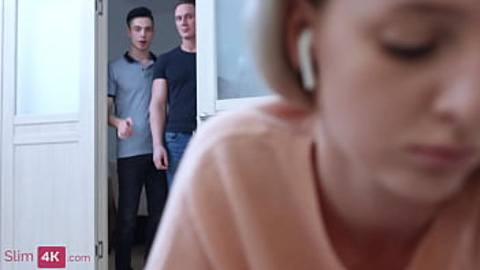 Stretched submissive honey gets hammered simultaneously by lusty studs in filthy carnal affair